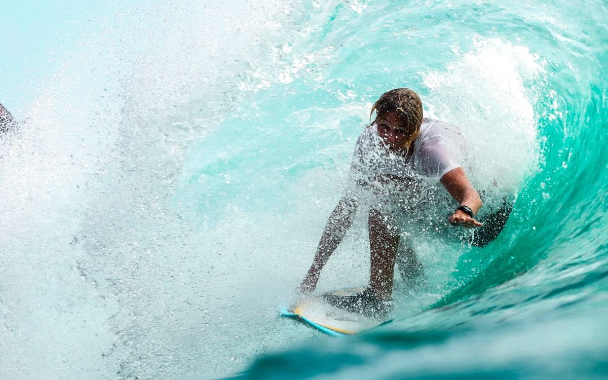 Surfer Riding Wave